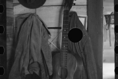 2432_Coats and guitar, Interior of  home between Chilicothe and Columbus, Ohio