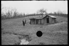 2461_Resettlement Administration representative outside client's  house/shack , Jackson County