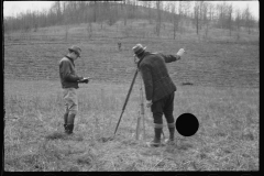 2506_Surveying , possibly  planting trees Zaleski Forest Project, Vinton County, Ohio