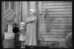 2623_Rehabilitation client's wife and child outside their home , Jackson County, Ohio