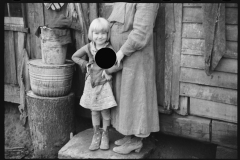 2624_Rehabilitation client's wife and child outside their home , Jackson County, Ohio