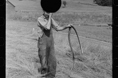 2823_Sharpening a scythe, Windsor County, Vermont