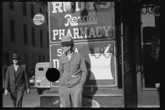 3077_Man outside pharmacy , main street, Saturday afternoon, Hagerstown, Maryland