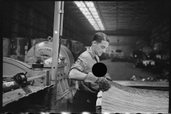 3112_Steelworker at galvanizing machine, Pittsburgh, Pennsylvania