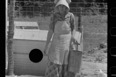 3248_Farmer's wife feeding the chickens , Scioto Farms, Ohio