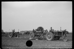 3303_ Three Farmall Tractors in use at Wabash Farms, Indiana