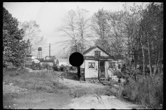 3305_Mill workers  shacks along river, Millville, New Jersey