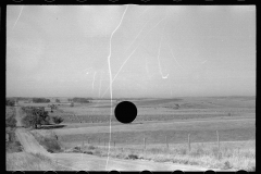 3384_Country road  through grazing land, Dawson County, Nebraska     (spoiled negative )