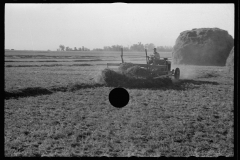 3387_Using a power rake on the alfalfa fields of Dawson County, Nebraska.