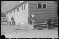 3681_Miner carrying  groceries Caples, West Virginia