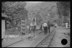 3695_Miners returning from work , Omar, West Virginia