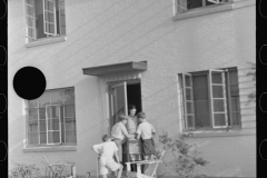 3797_Mother at the door with children , Greenbelt, Maryland