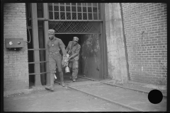 3844_Miners handing  in their  lamps . Caples, West Virginia