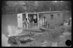 3847_ Family living on riverboat, Charleston, West Virginia.