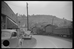 3880_Train hauling  coal through centre of  Osage, West Virginia