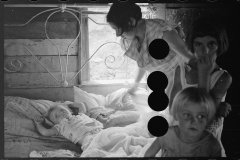 0007_Wife of sharecropper with  sick child