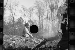 0348_Transient worker clearing land, Prince George's County, Maryland]
