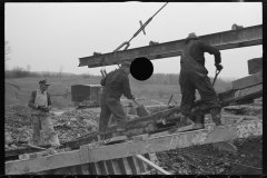 1189_ Lifting an RSJ into place for bridge construction .  Location unknown