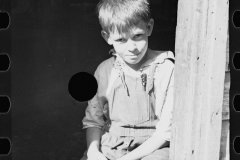1249_ Young boy , agricultural style dress , unknown location