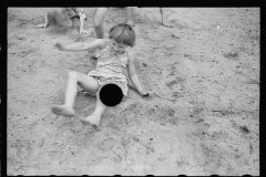 01544_Children enjoying a sandy slope . Irwinville farms , Georgia