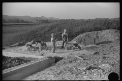 3895_ children playing in pile of  sand, Tygart Valley, West Virginia