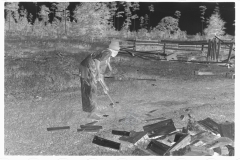 0058_Black_American boy chopping wood, Tangipahoa Parish , Louisiana