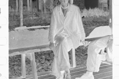 0165_Man on bench outside  Post Office at Nethers, Virginia