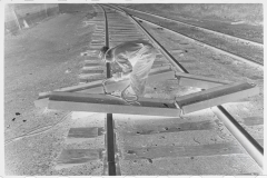 0744_Track worker cutting a steel section with a welding torch , unknown location