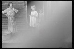 1039_Trische family, tenant farmers, Plaquemines Parish, Louisiana.    Light ingress on negative.