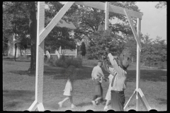 1058_Erecting  a  rig for gymkhana game , probably London, Ohio