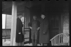 1272_Probably resettlement officials speaking with client. Possibly Ohio