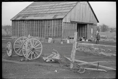 1296_Large barn and wagon chassis, unknown location