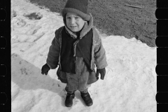 1358_ Small boy in snow ,   probably Westmoreland Homesteads