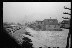 1360_Housing by Railroad tracks. Snow . Negative partly spoilt