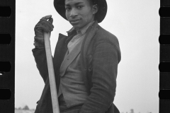 1402_young African-American  agricultural worker , unknown location