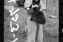 1497_ Small child with her cat , Possibly Lost River , New Hampshire