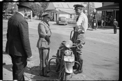 1507_Street scene with motorcycle, probably Albany , Vermont