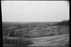 01574_farming land with adjacent major soil erosion , possibly Tennessee