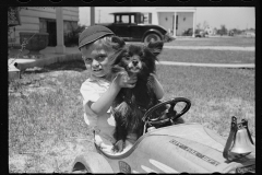 1648_Young boy in his pedal car and dog  Decatur Homesteads , Indiana