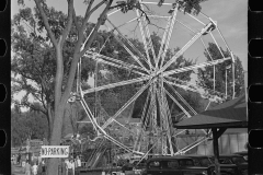 1886_Ferris wheel at travelling fair ground , location unknown