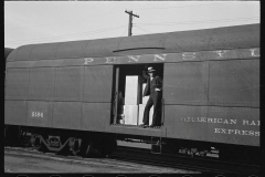 1911_Smartly dressed gent in Pennsylvania Railroad boxcar, Hagerstown MD