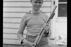 1975_Young lad with simple rifle ,  Decatur Homesteads