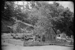 1995 _Traditional House with fencing , possibly Martin County , Indiana