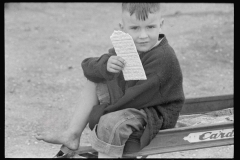 2012_smal boy with wafer biscuit , possibly Wabash Farms  Indiana