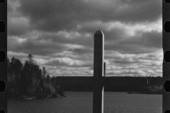 2381_ Lonely cross and abandoned log  rollway  , Au Sable River, Michigan