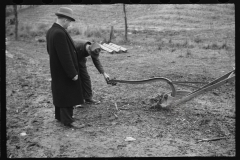 2470_Resettlement Administration agent with client and possibly broken Plough