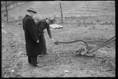 2471_Resettlement Administration agent with client and possibly broken Plough