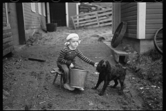 2779_Vermont farmer's daughter with pet dog