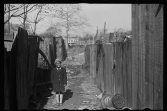 2967_Young black-American girl in alley way in deprived area of Washington DC