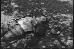 2994_Transient labourer asleep in park, Gateway District, Minneapolis, Minnesota